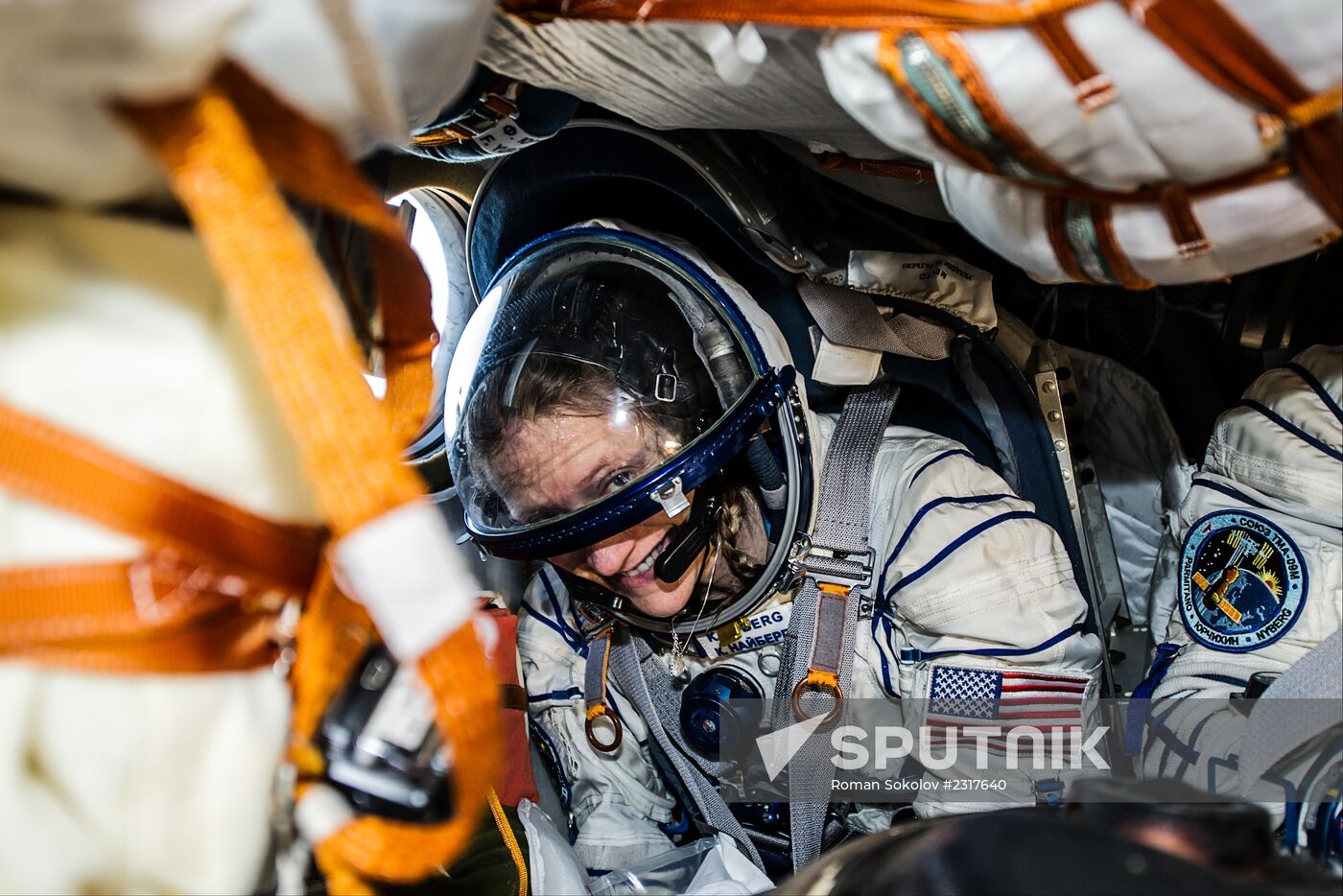 ISS capsule carries Olympic torch to Earth