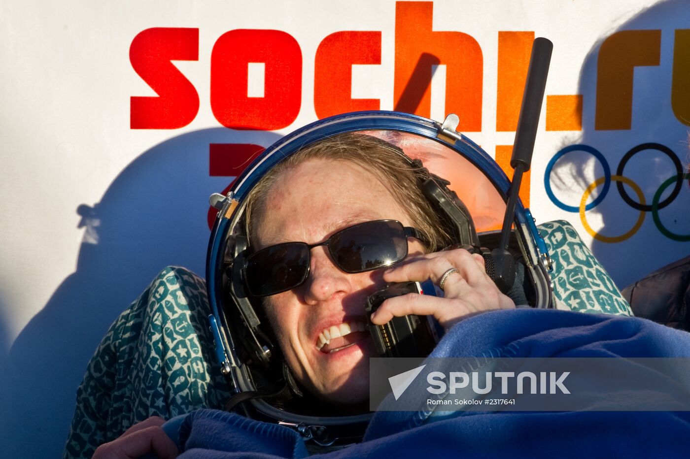 ISS capsule carries Olympic torch to Earth