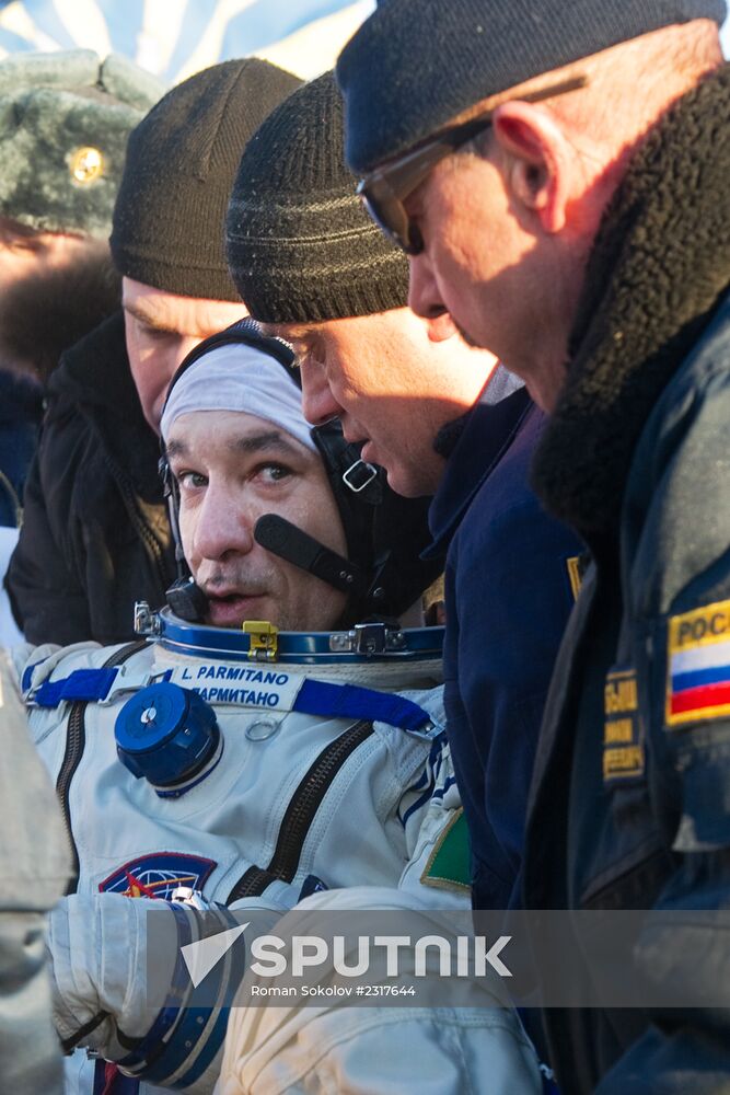 ISS capsule carries Olympic torch to Earth