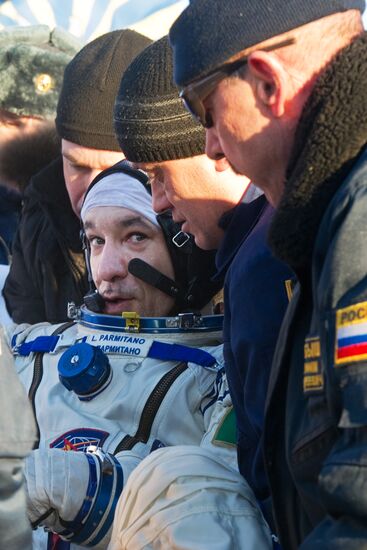 ISS capsule carries Olympic torch to Earth
