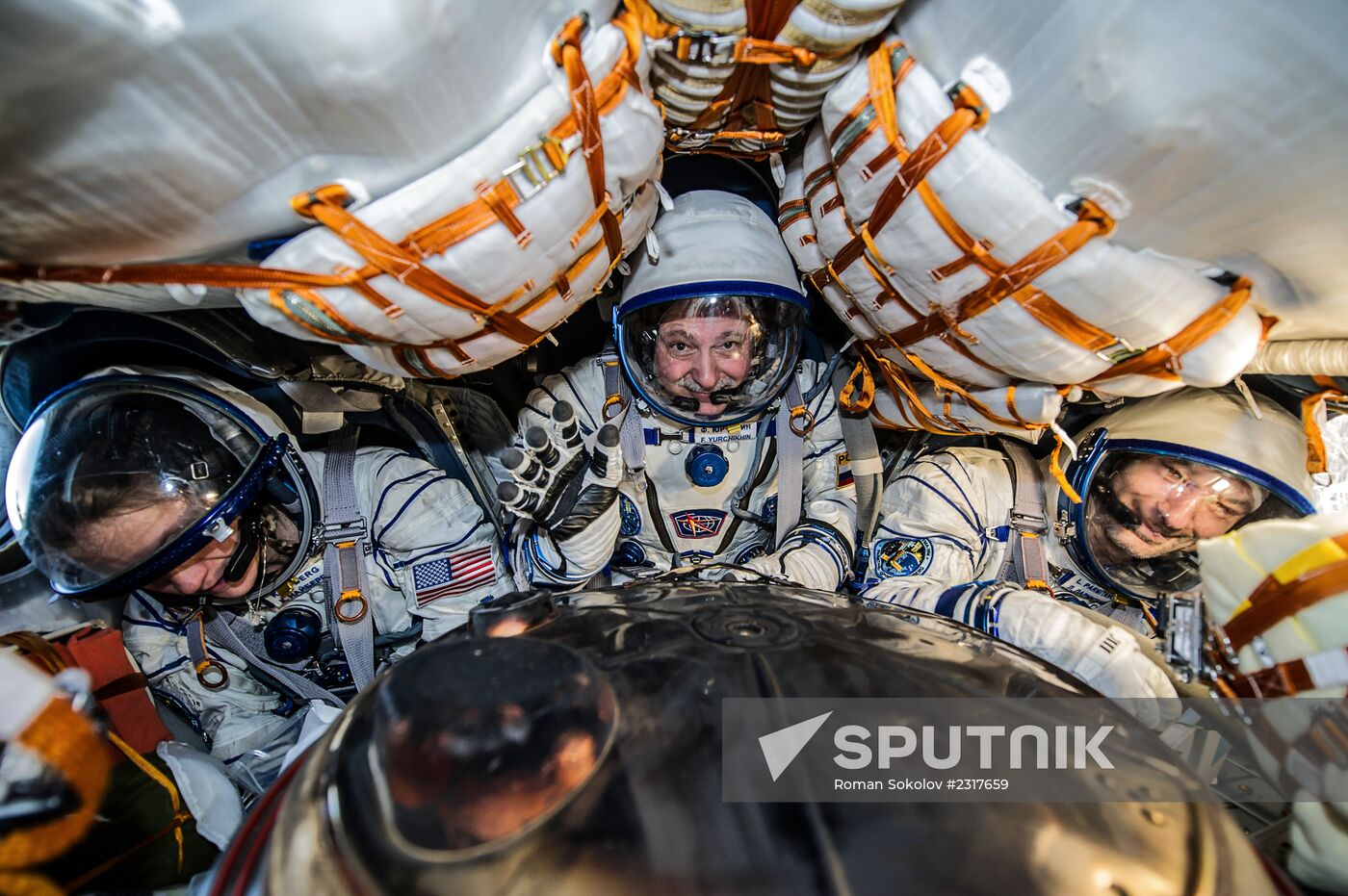 ISS capsule carries Olympic torch to Earth