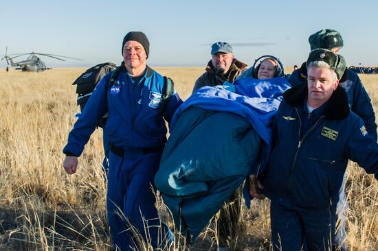 ISS capsule carries Olympic torch to Earth