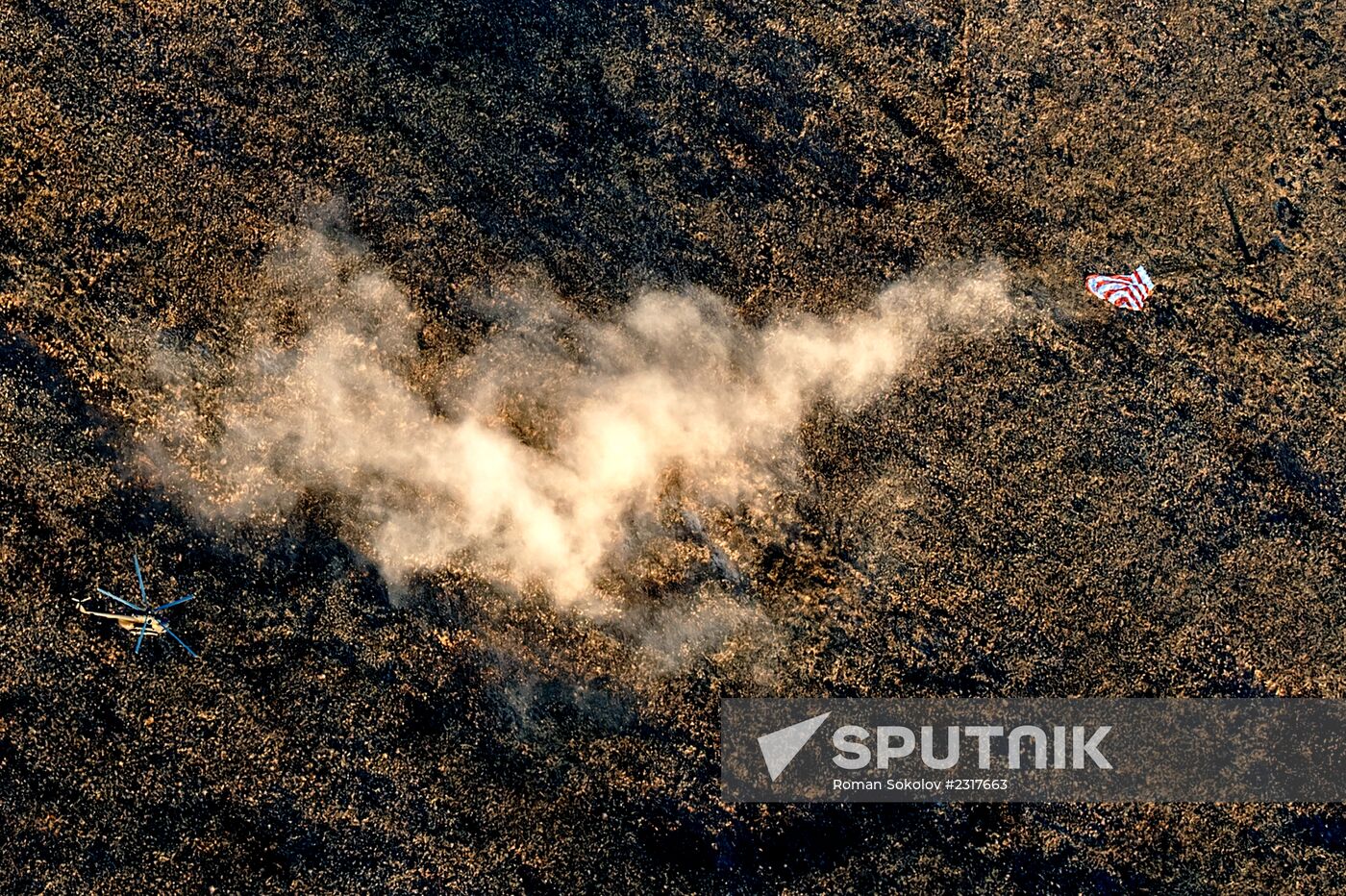 ISS capsule carries Olympic torch to Earth