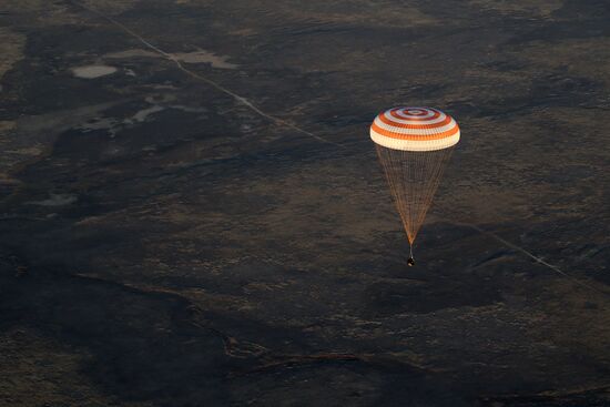 ISS capsule carries Olympic torch to Earth