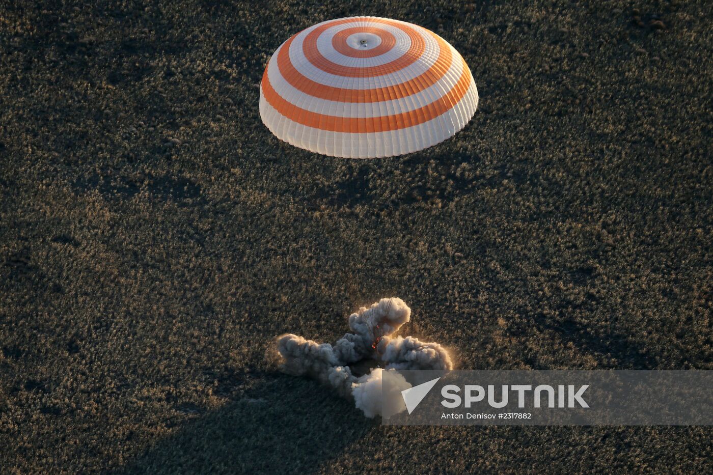 ISS capsule carries Olympic torch to Earth
