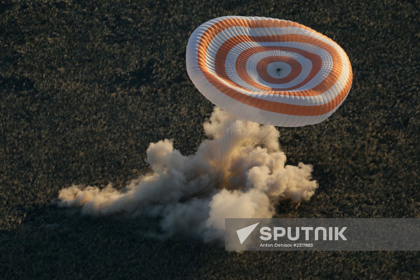 ISS capsule carries Olympic torch to Earth