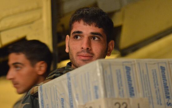 Russian plane with humanitarian aid arrives in Syria