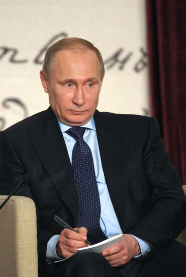 Vladimir Putin attends Russian literary assembly