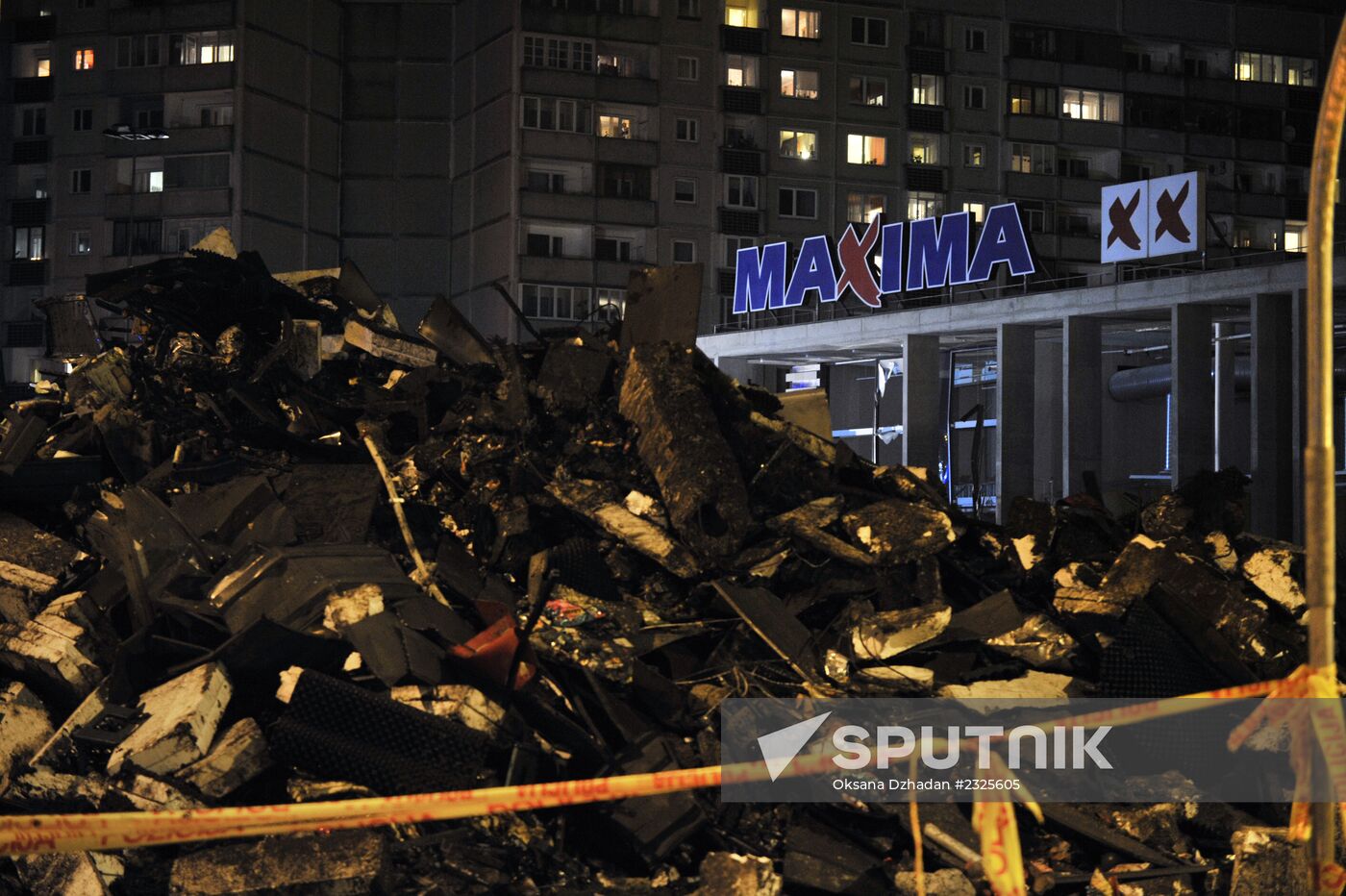 Riga residents mourn supermarket roof collapse victims