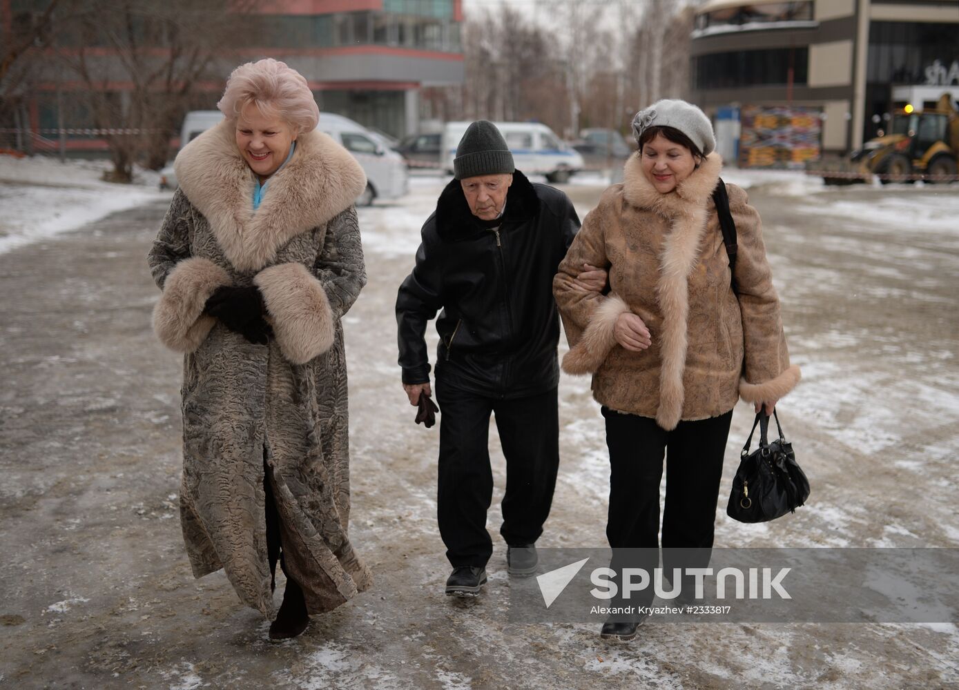 Siberian centenarian Alexander Kaptarenko carries the Olympic flame