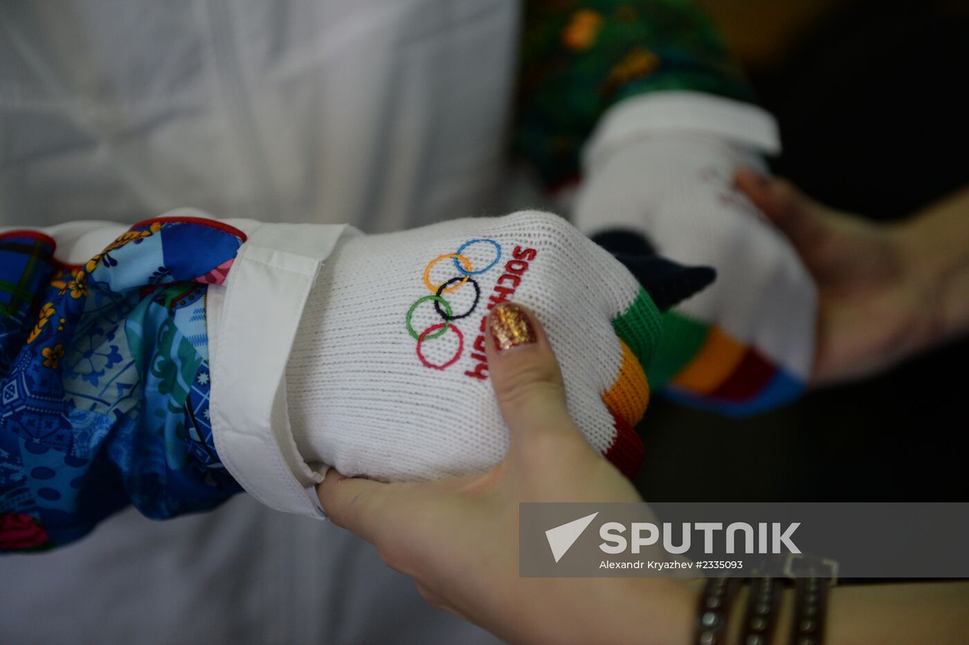 Centenarian Alexander Kaptarenko carries the Olympic flame