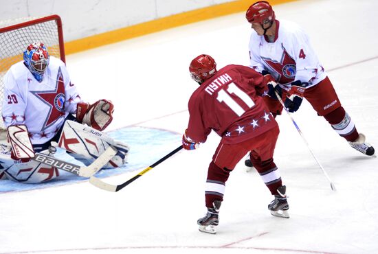 Vladimir Putin takes part in friendly hockey match