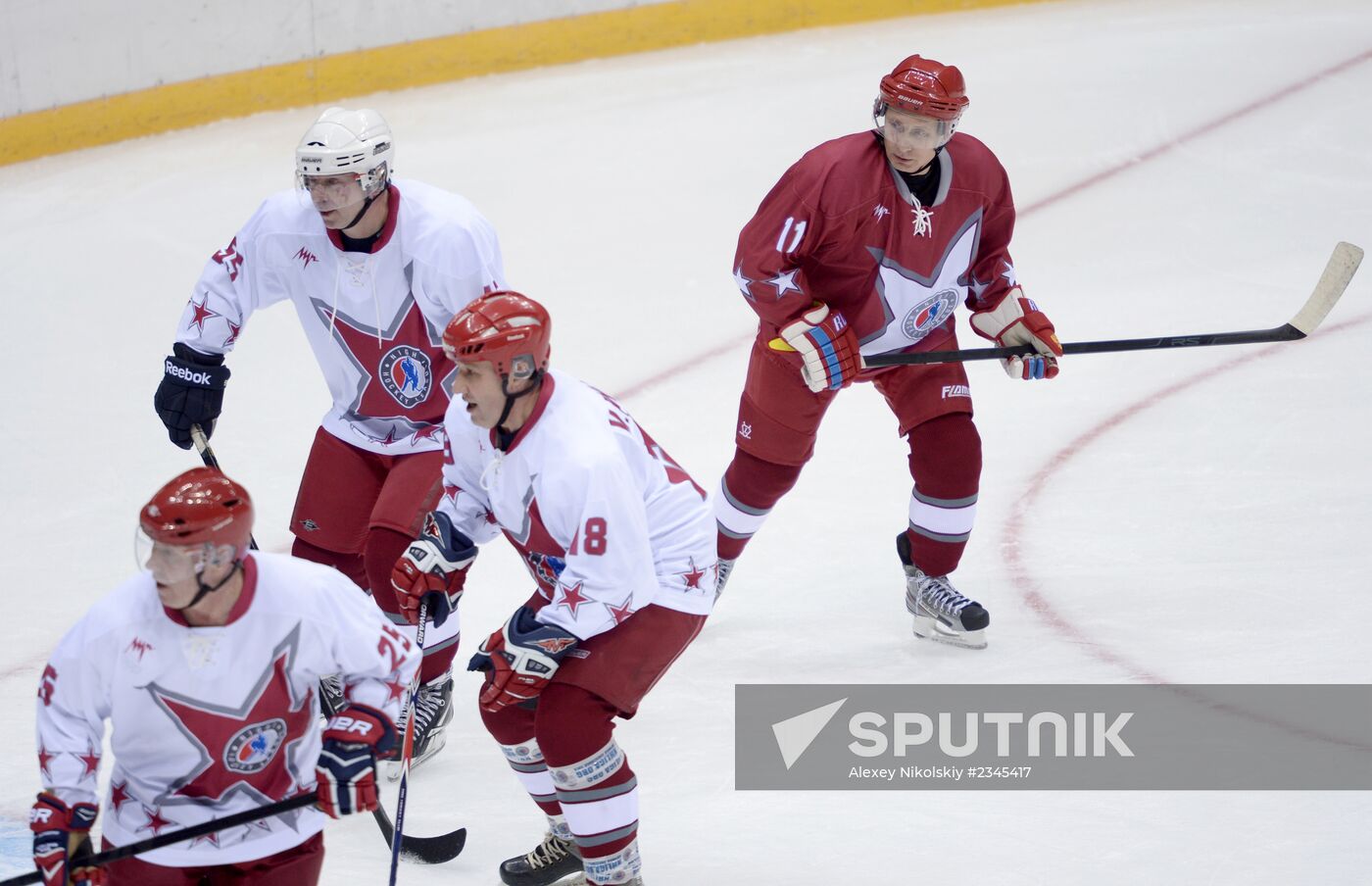 Vladimir Putin takes part in friendly hockey match