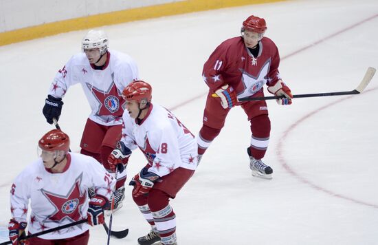 Vladimir Putin takes part in friendly hockey match