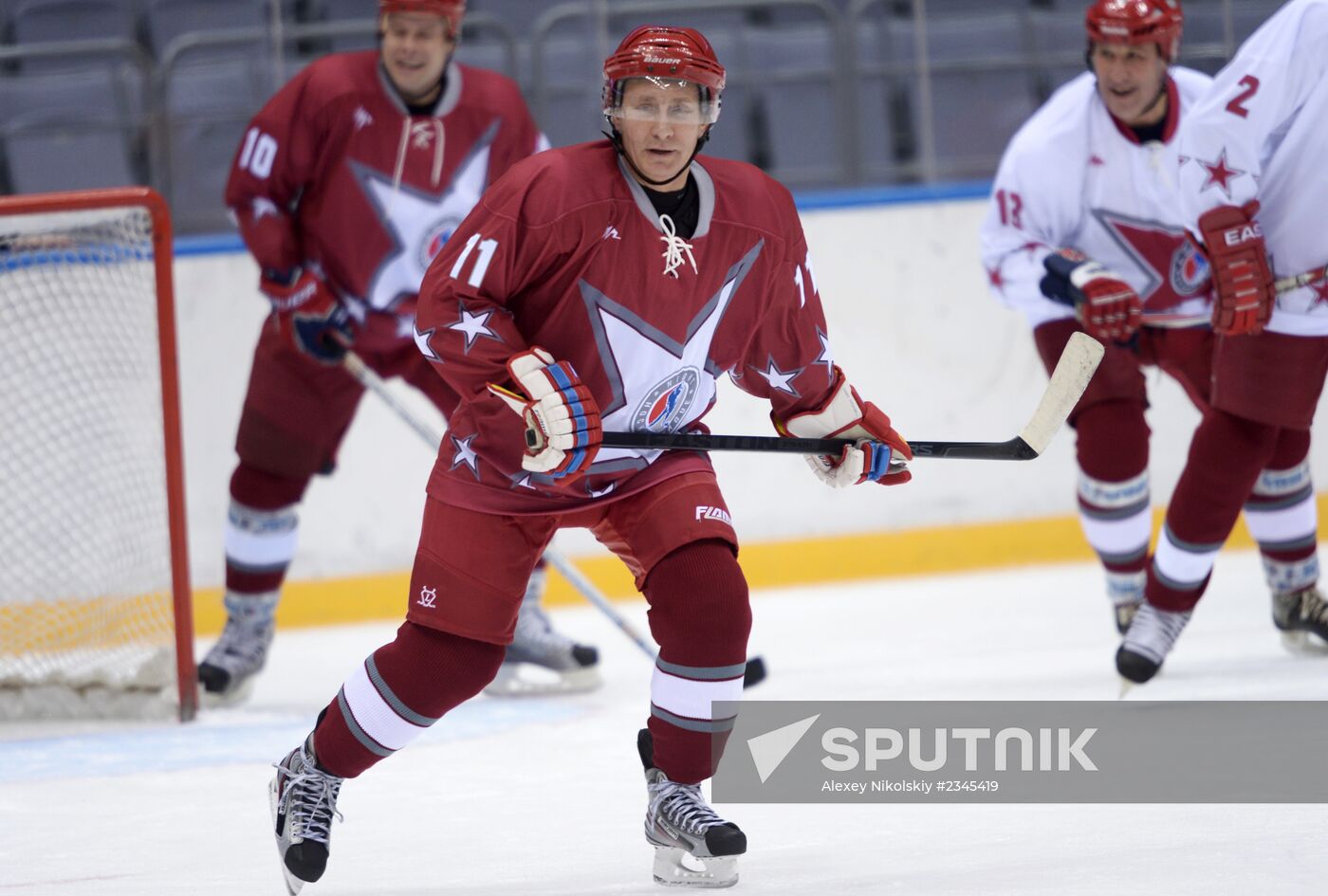 Vladimir Putin takes part in friendly hockey match