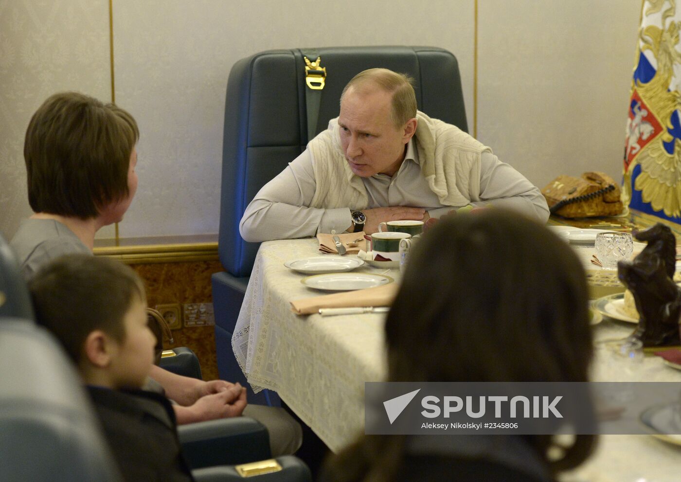 Vladimir Putin meets family of Far East flood relief worker killed on duty