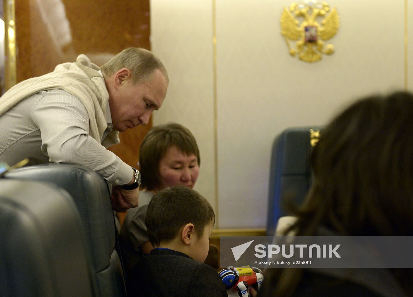 Vladimir Putin meets family of Far East flood relief worker killed on duty