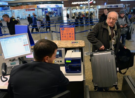 Checking passengers and luggage at Sheremetyevo airport