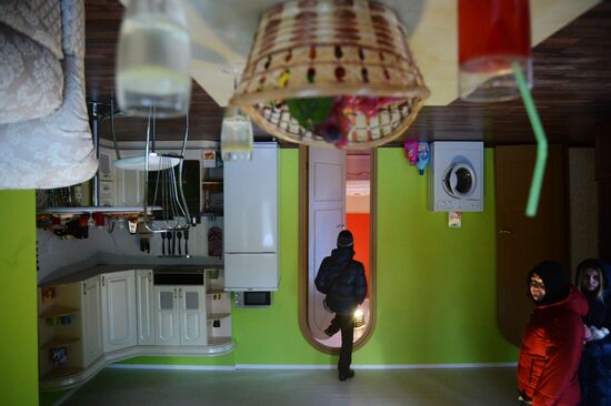 Opening of new amusement ride, upside-down house at VVC