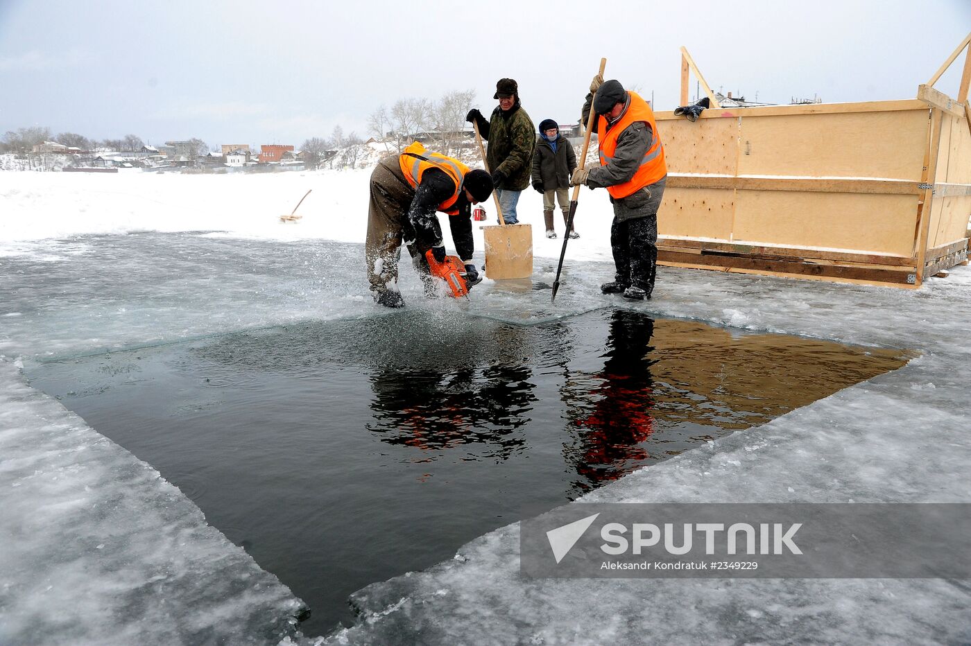 Preparation of ice holes for Epiphany bathing in Russia