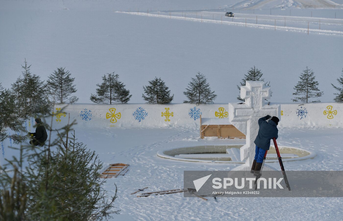 Preparation of ice holes for Epiphany bathing in Russia