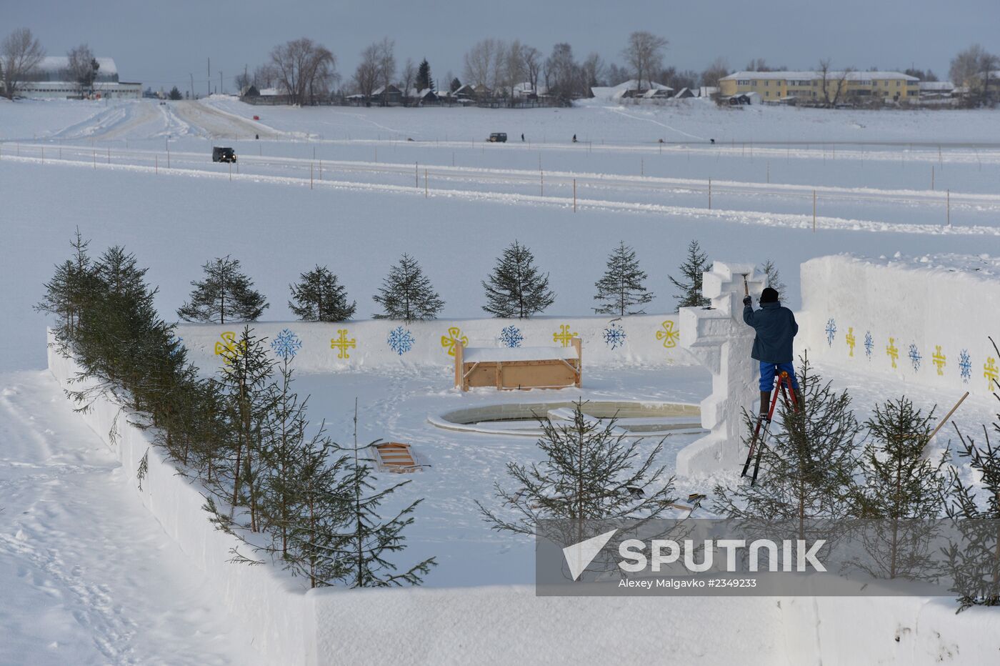 Preparation of ice holes for Epiphany bathing in Russia