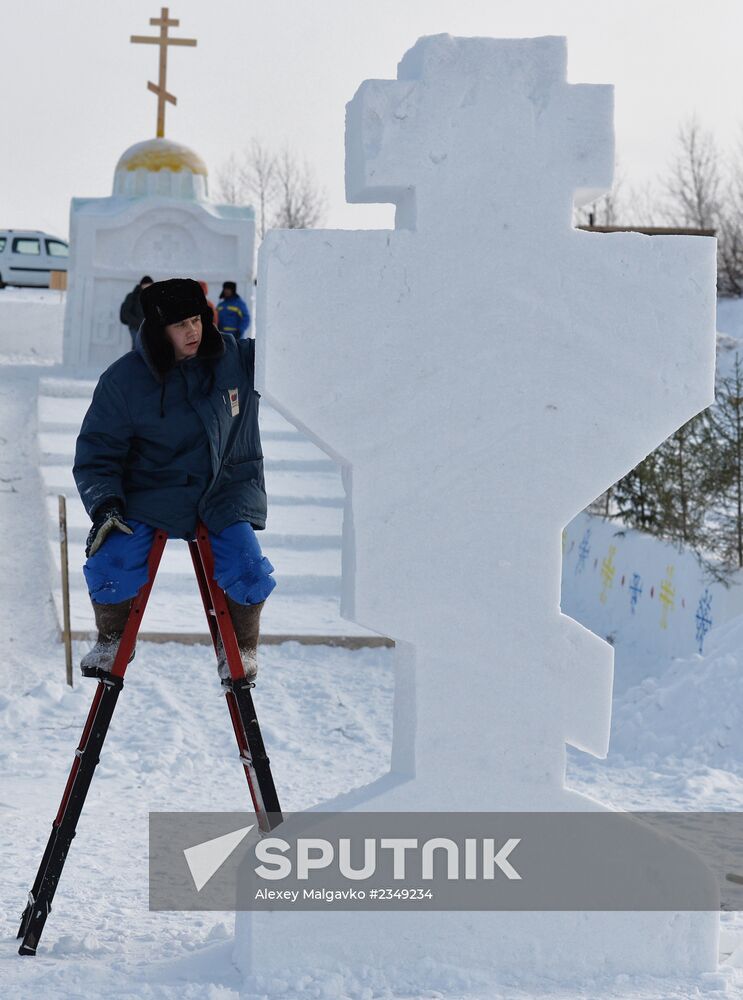 Preparation of ice holes for Epiphany bathing in Russia