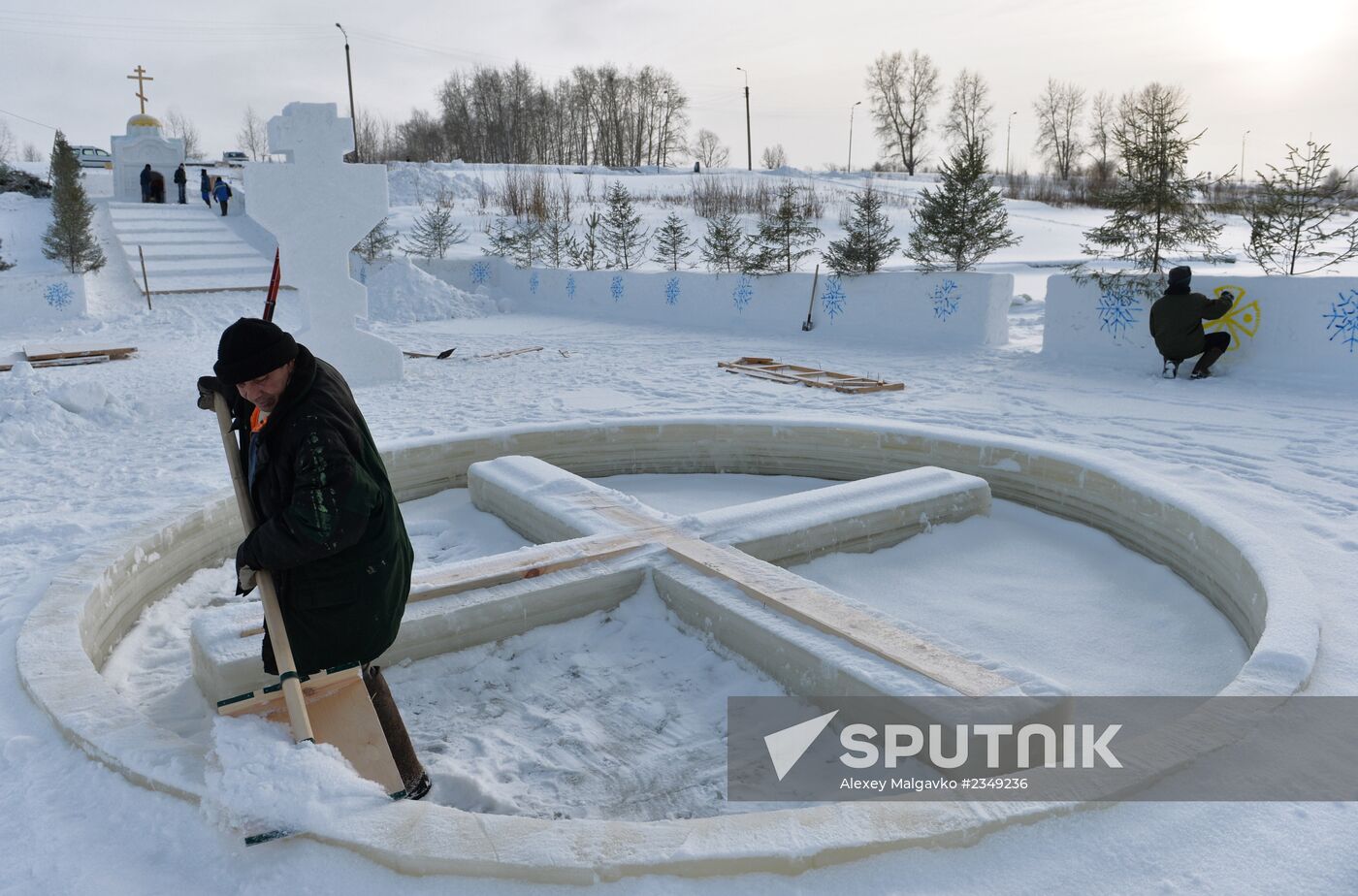 Preparation of ice holes for Epiphany bathing in Russia