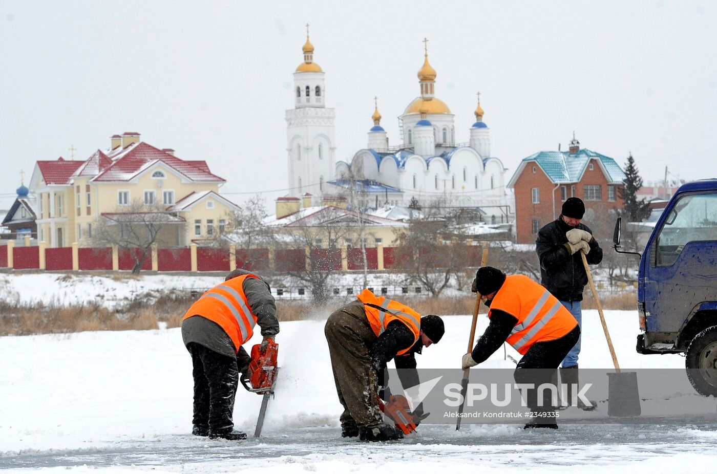 Preparing ice-holes for Epiphany bathing in Russian regions