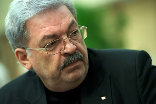 2014 Winter Olympics. Russian speed skater Ivan Skobrev's photo session