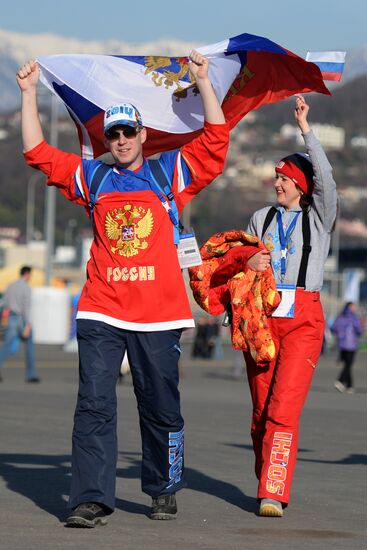 Spectators arrive for the XXII Olympic Winter Games opening