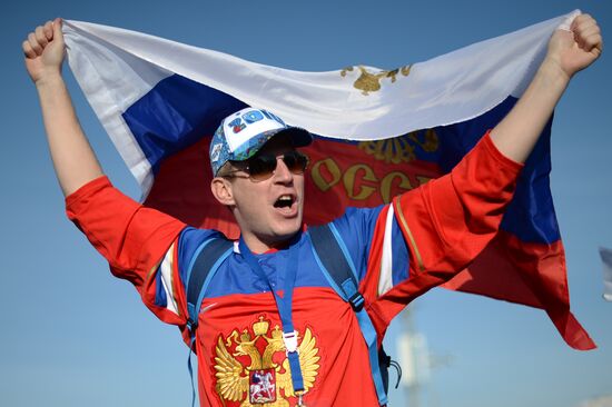Spectators arrive for the XXII Olympic Winter Games opening
