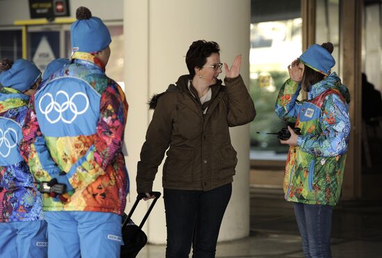 2014 Winter Olympics. Volunteers welcome guests at Sochi airport