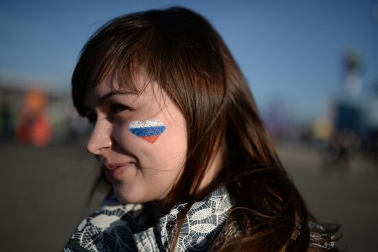Spectators arrive for the XXII Olympic Winter Games opening