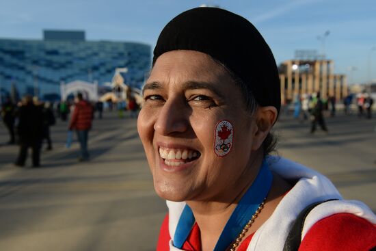 Spectators arrive for the XXII Olympic Winter Games opening