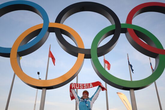 Spectators arrive for the XXII Olympic Winter Games opening