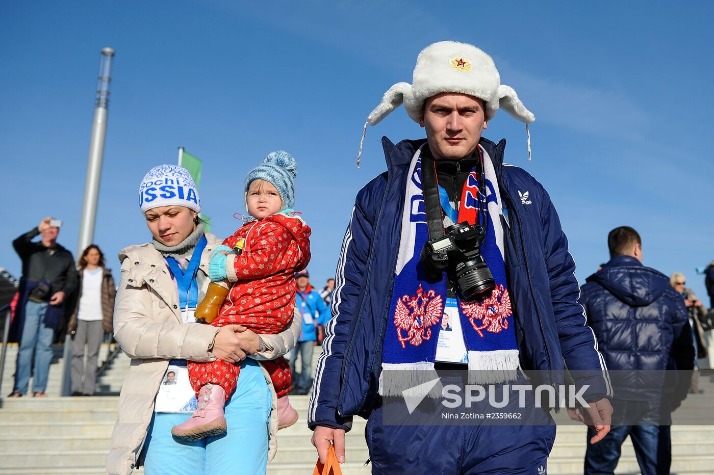 Spectators arrive for the XXII Olympic Winter Games opening