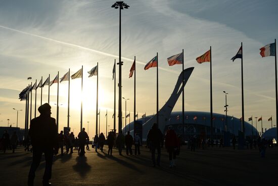 Spectators arrive for the XXII Olympic Winter Games opening