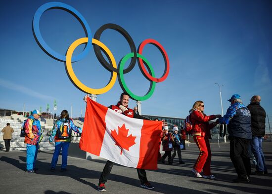 Spectators arrive for the XXII Olympic Winter Games opening