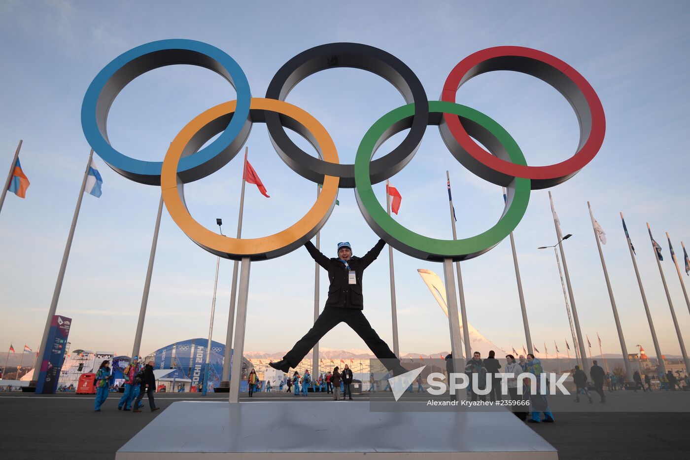 Spectators arrive for the XXII Olympic Winter Games opening