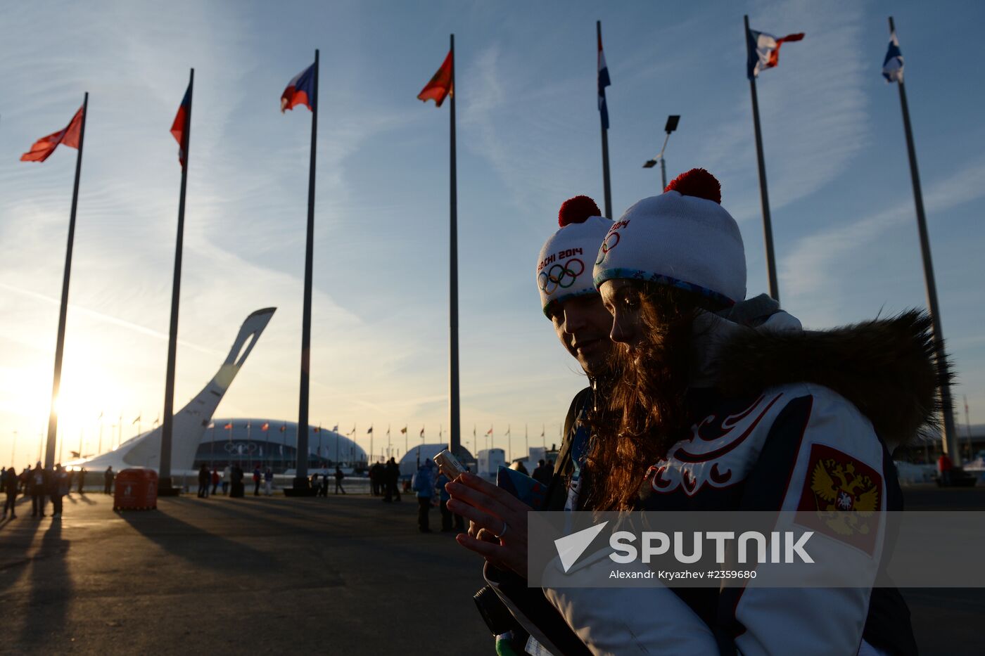 Spectators arrive for the XXII Olympic Winter Games opening