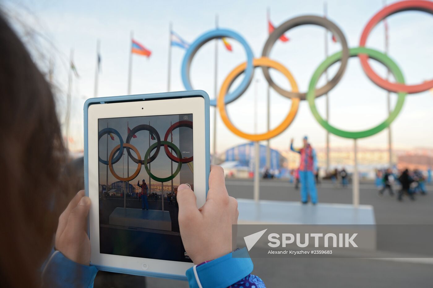 Spectators arrive for the XXII Olympic Winter Games opening