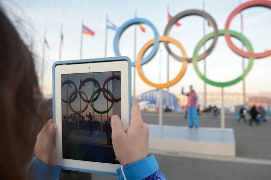Spectators arrive for the XXII Olympic Winter Games opening