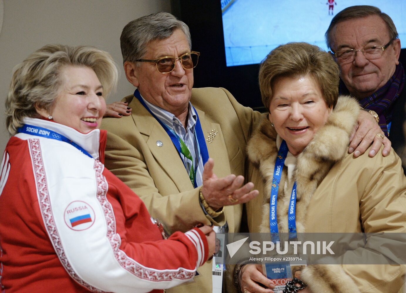 Spectators arrive at the opening ceremony of the 2014 Winter Olympics