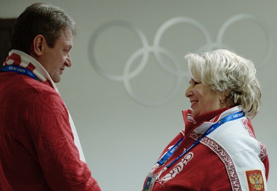 Spectators arrive at the opening ceremony of the 2014 Winter Olympics