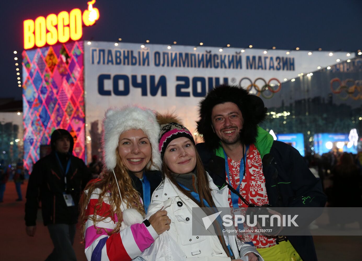 Spectators arrive at the open ceremony of the 2014 Winter Olympics