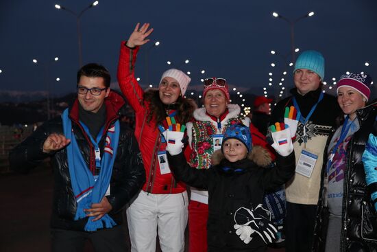 Spectators arrive at the opening ceremony of the 2014 Winter Olympics