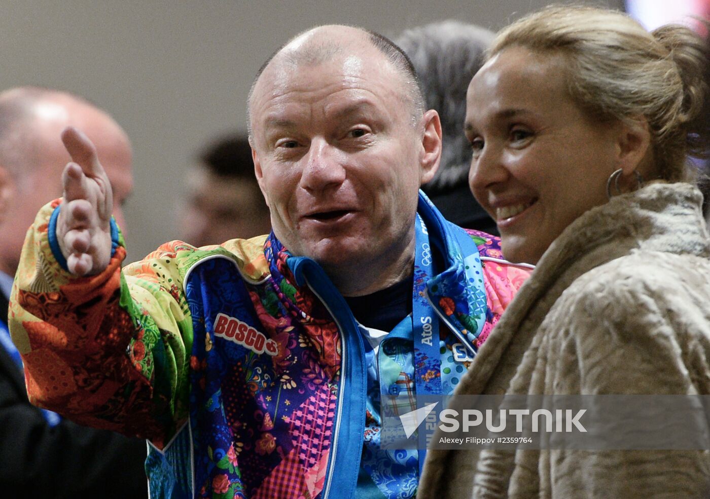 Spectators arrive at the opening ceremony of the 2014 Winter Olympics