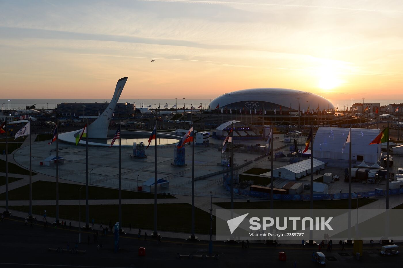 Spectators arrive at the opening ceremony of the 2014 Winter Olympics