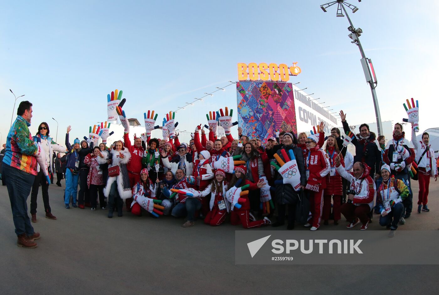 Spectators arrive at the opening ceremony of the 2014 Winter Olympics
